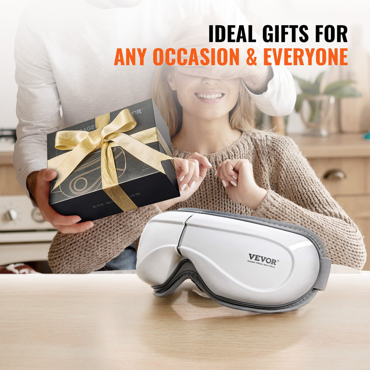 Heated eye massager showing its adjustable strap and control button