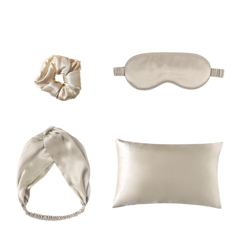 Silk Sunday Reset Set in champagne silk: sleep mask, pillowcase, scrunchie and headband