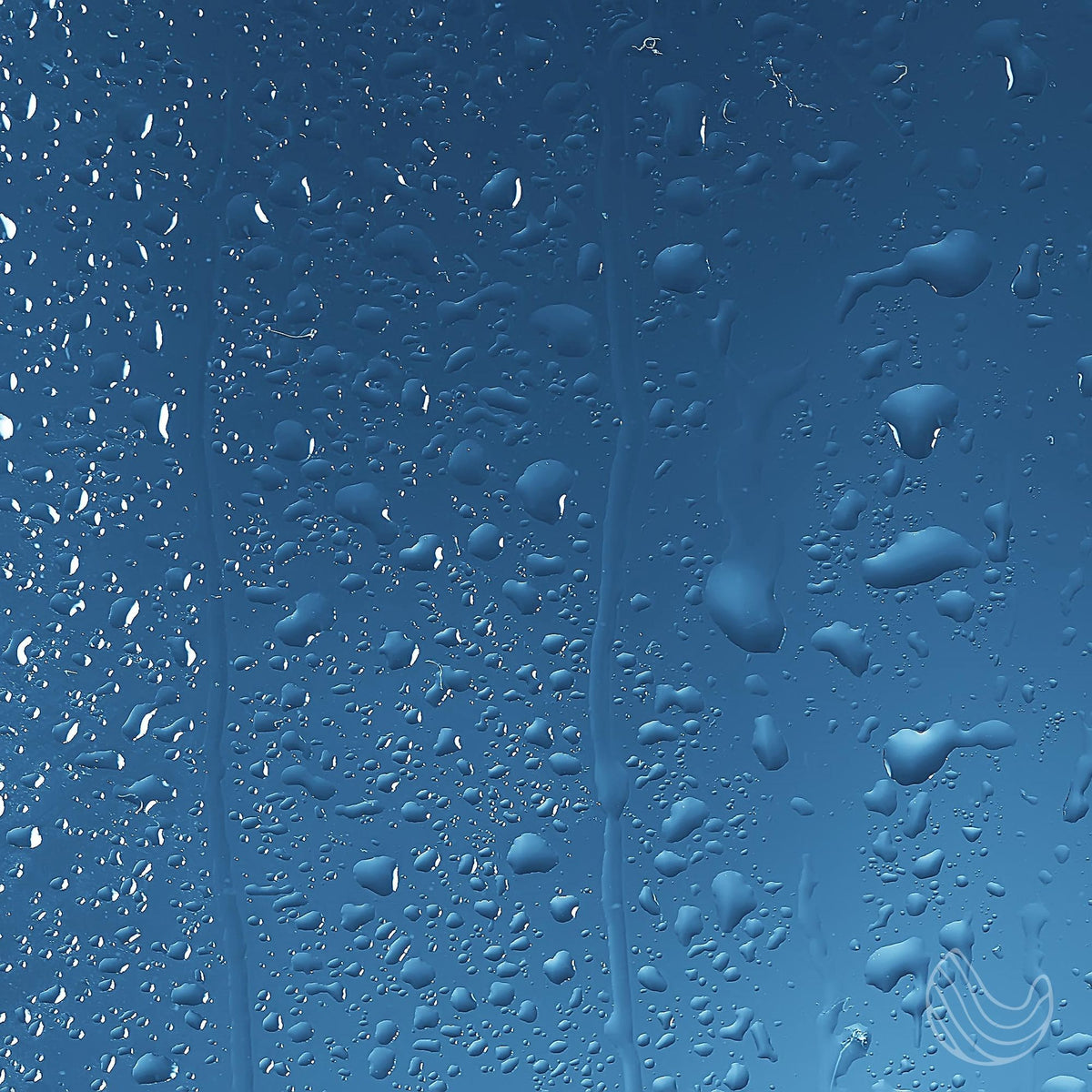 Water droplets on blue shower glass