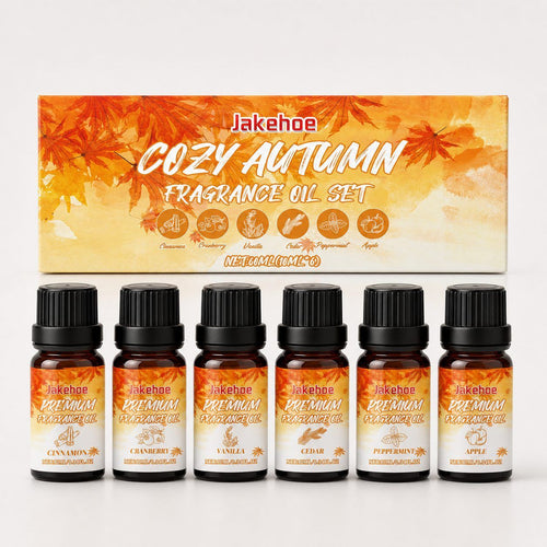 Autumn Hearth diffuser oil set: six amber bottles in front of an autumn-leaf box