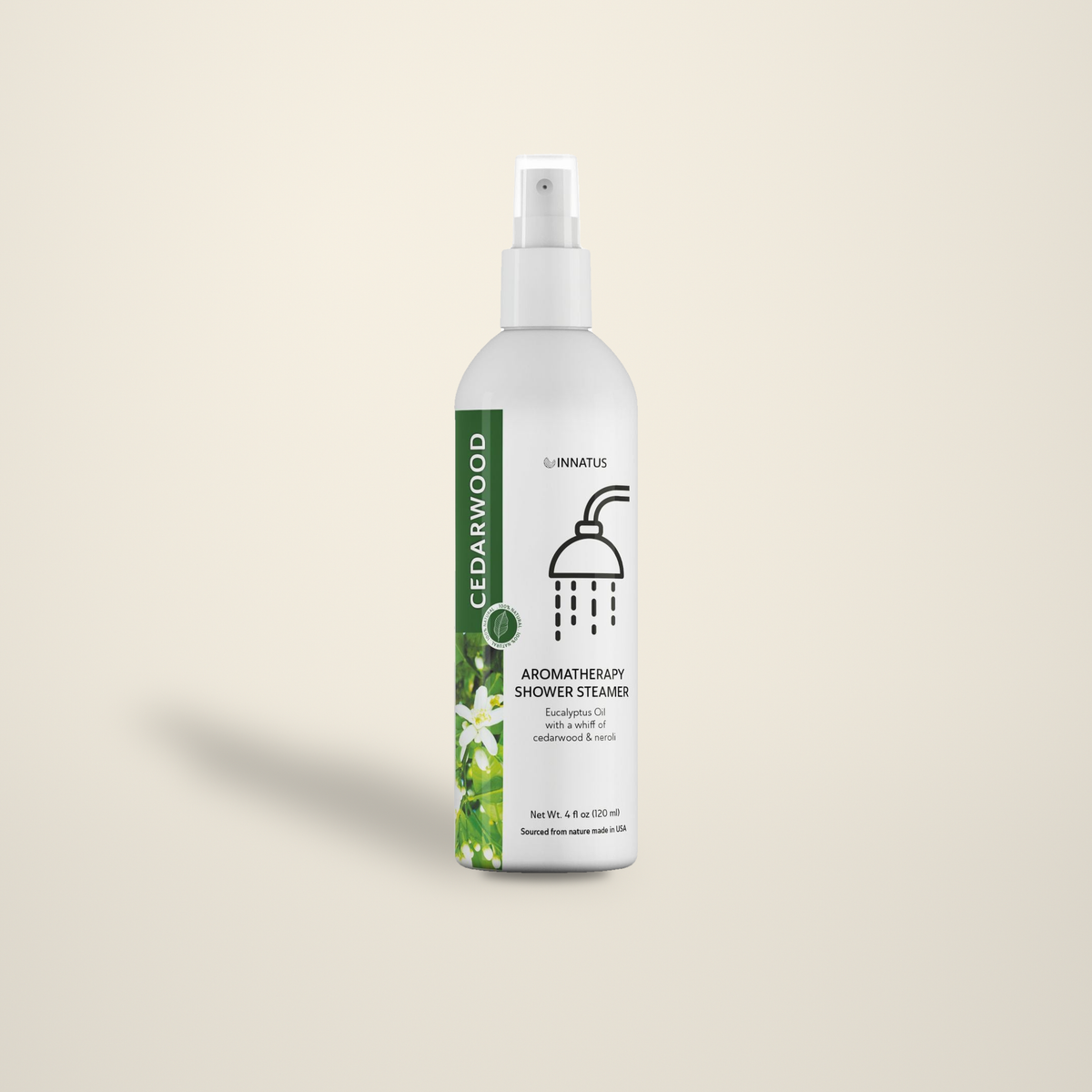 Cedarwood & Eucalyptus Shower Mist spray bottle on a warm cream backdrop