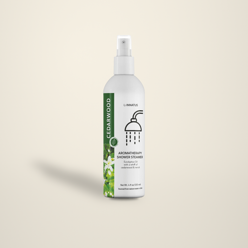 Cedarwood & Eucalyptus Shower Mist spray bottle on a warm cream backdrop