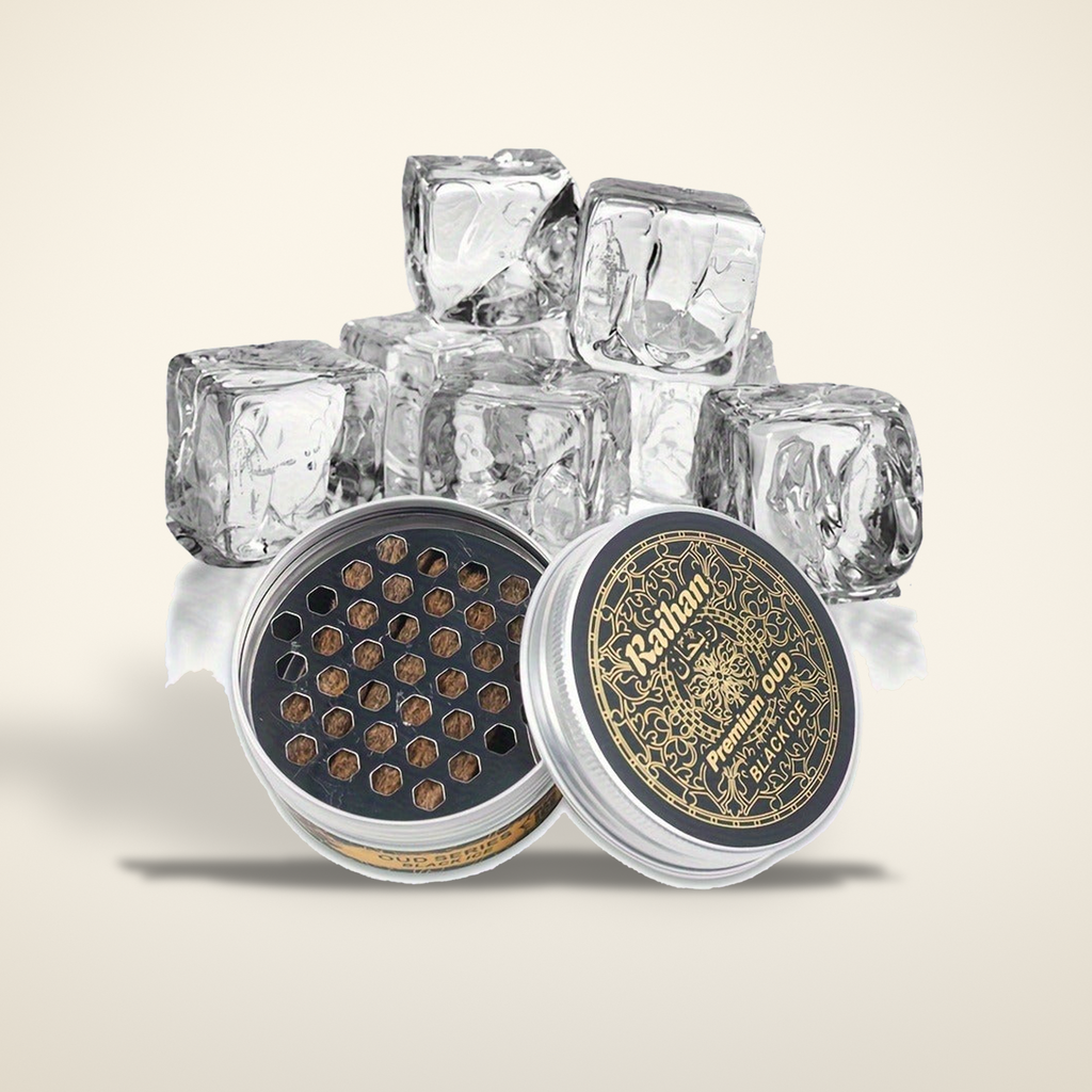 Hearthside aromatherapy tins, open, on a warm candlelight cream background